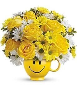 Smiley Face ceramic floral arrangement